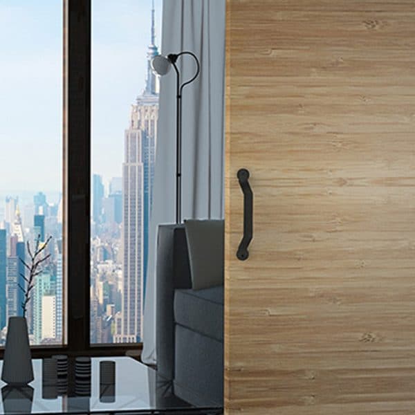 Ambiance image of our sliding door pull handle – 2 fasteners - Black metal - Perfect for barn door