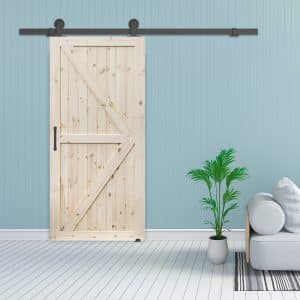 Ambiance image of a sliding barn door with our steel trapezoidal handle