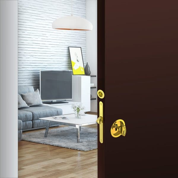 Ambiance image of our mortise lock assembly kit – Round finger pull and flush handles with key - Steel with golden finish 2