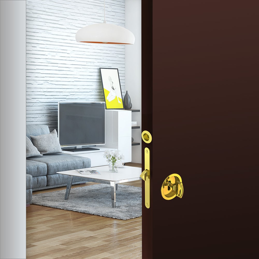 Ambiance image of our mortise lock assembly kit – Round finger pull and flush handles with key - Steel with golden finish 2