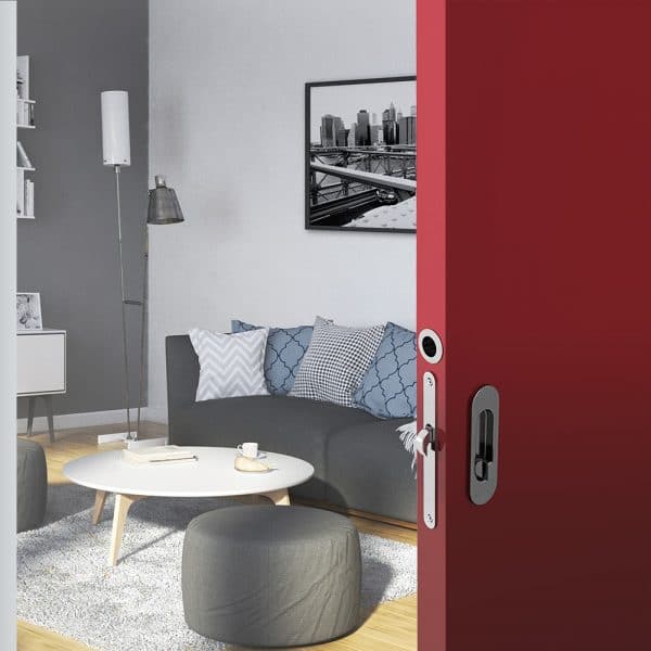 Ambiance image of our mortise lock kit – Round finger pull and oval flush handles with locking device - Steel with satin finish